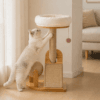 Cat scratching the sisal post on a compact cat climbing frame with plush top bed and wood base