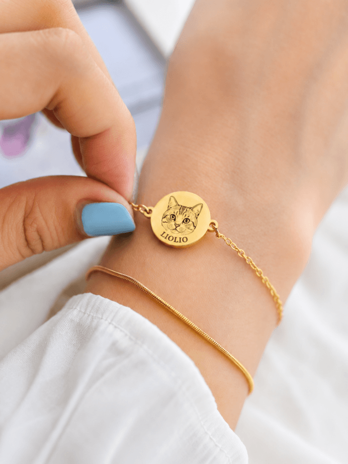 Gold-tone custom pet portrait bracelet with round charm made from a pet photo