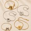 Custom pet portrait bracelets in gold-tone and silver-tone finishes with personalized dog and cat face charms